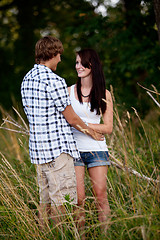 Image showing young love couple smiling outdoor in summer 