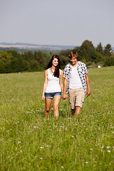 Image showing young love couple smiling outdoor in summer 