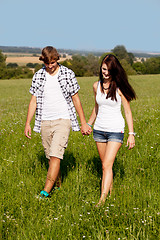 Image showing young love couple smiling outdoor in summer 