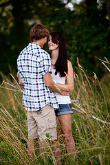 Image showing young love couple smiling outdoor in summer 