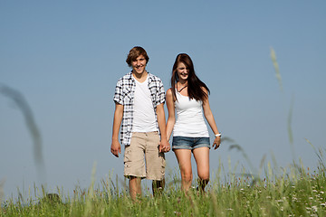 Image showing young love couple smiling outdoor in summer 