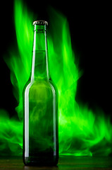 Image showing Beer bottle with color fire