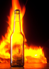 Image showing Beer bottle with color fire