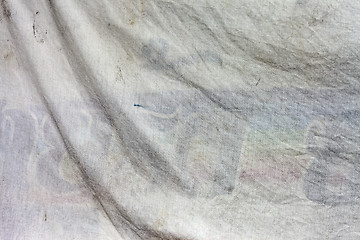 Image showing Old dirty white fabric with waves