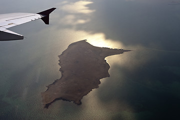 Image showing View through airplane porthole