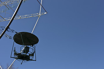 Image showing ferris wheel against a blue sky