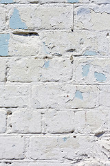 Image showing white textured brick wall painted