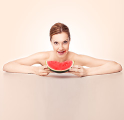 Image showing Attractive woman with watermelon piece