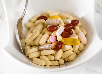 Image showing Vitamins in bowl of tablets