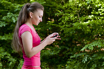 Image showing Girl with phone