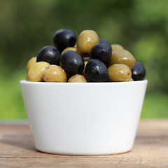 Image showing Green and black olives