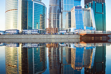 Image showing Skyscrapers at sunset and reflection