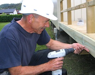 Image showing Carpenter building a veranda