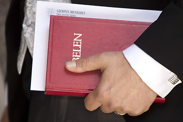 Image showing Groom with bible