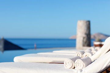 Image showing sunbeds by the pool