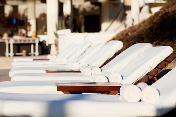 Image showing sunbeds by the pool