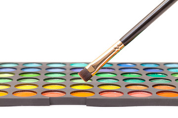 Image showing Set of Multicolored Eyeshadows with Brush