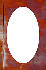 Image showing Rusty tin wall and white oval in center 