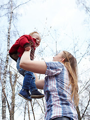 Image showing Mother, son, and sky