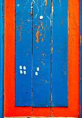 Image showing Blue and red wooden board lumber.