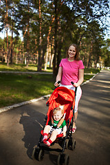 Image showing Smiling boy and mom