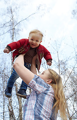 Image showing Mother, son, and sky