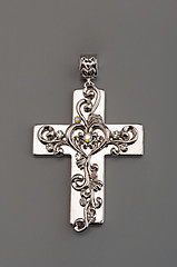 Image showing Silver cross on gray