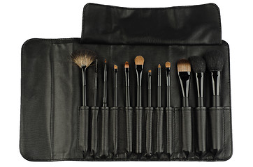 Image showing Set of black makeup brushes isolated on white