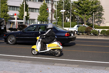 Image showing Scooter in the traffic