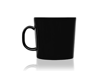 Image showing Black mug empty blank for coffee or tea isolated