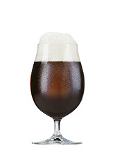 Image showing glass of brown beer on white background