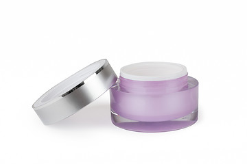 Image showing purple container of cream on white background