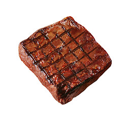 Image showing hot fresh grilled boneless rib eye steak isolated on white with barbecue grill marks in the meat