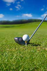 Image showing Golf club with ball on tee