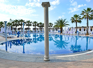 Image showing Water pool and chairs