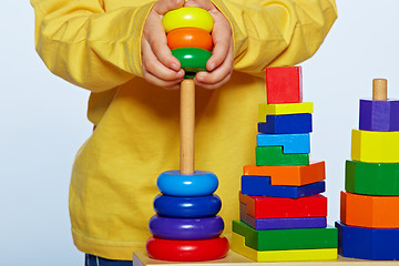 Image showing boy playing with pyramid