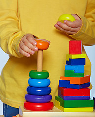 Image showing boy playing with pyramid