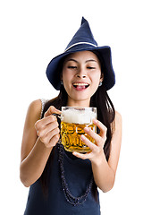Image showing beautiful woman with a huge draft beer