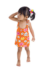 Image showing wary little girl walking