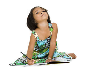 Image showing cute girl with notebook and pen