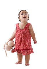 Image showing cute little girl looking up