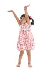 Image showing cute girl with arms up