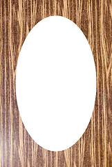 Image showing Cardboard background and white oval in center 