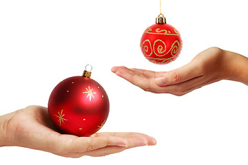 Image showing Hands and Baubles
