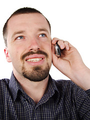 Image showing Happy male talking to mobile phone