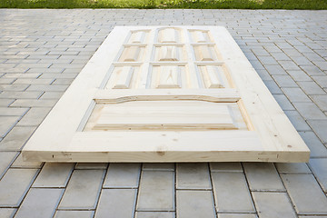 Image showing Wooden door made of coniferous tree