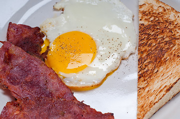 Image showing eggs bacon and toast bread