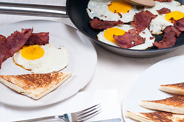 Image showing eggs bacon and toast bread