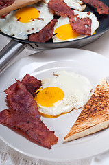 Image showing eggs bacon and toast bread