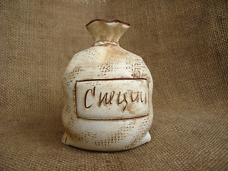 Image showing Ceramic bag on a brown background